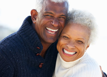 Smiling elderly African-American couple